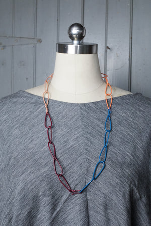 long Modular Necklace in burgundy, blue, and coral