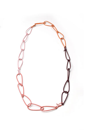long Modular Necklace in burgundy, coral, and pink