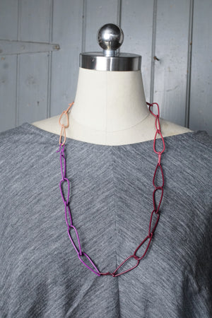 long Modular Necklace in burgundy, purple, and rose