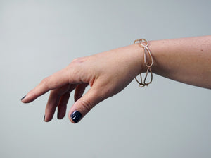 narrow monument bracelet in bronze