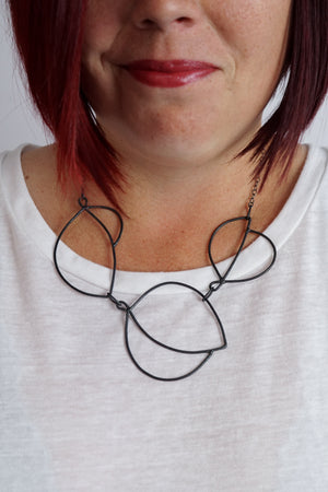 Embiller Necklace in steel, silver, or bronze