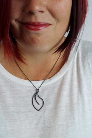 Fleurir Necklace in black steel, silver, or bronze