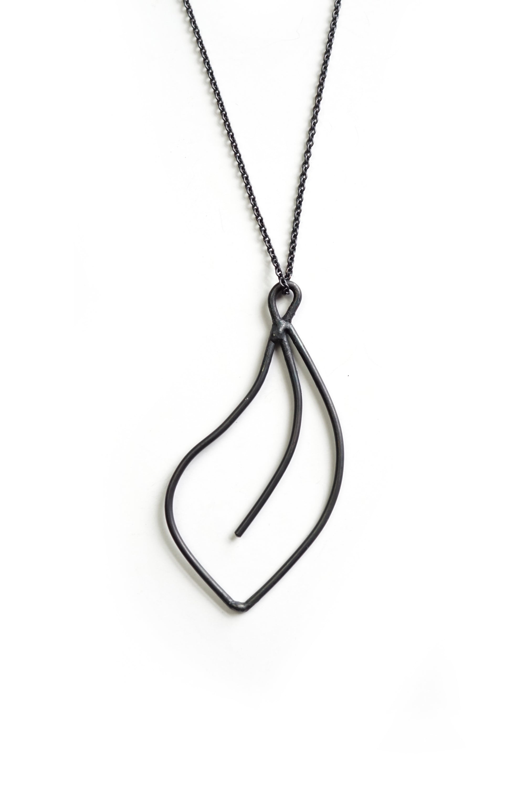 Flourish Necklace in black steel, silver, or bronze