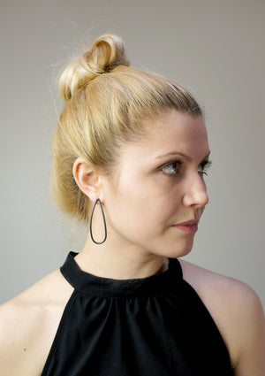 large petal post earrings in black