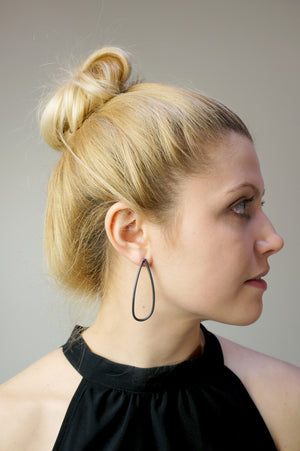 large petal post earrings in black