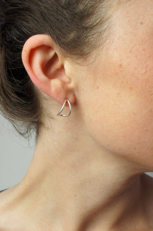 tiny curve post earrings in silver