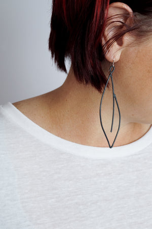 edgy and elegant black statement earrings