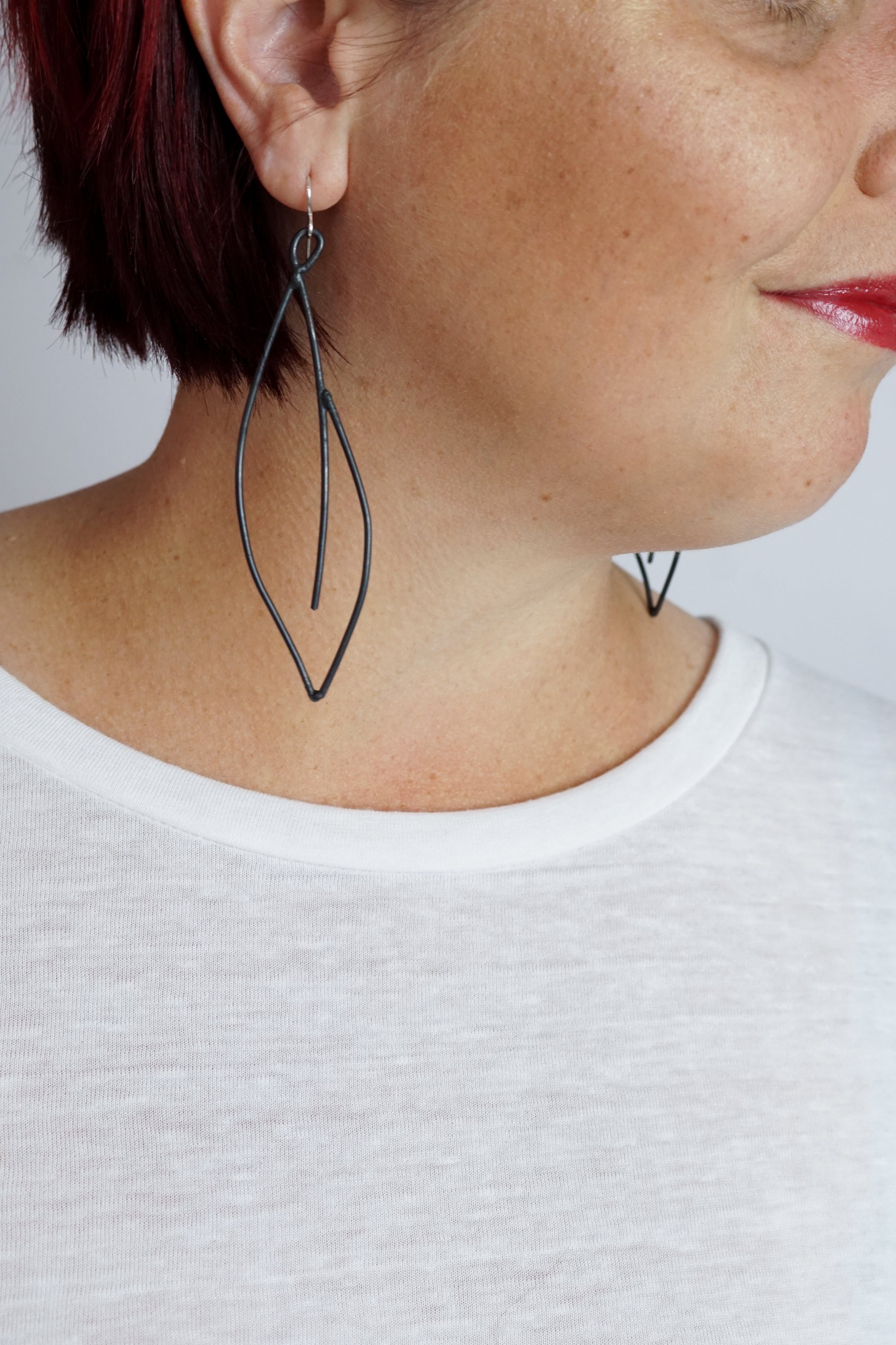 edgy and elegant black statement earrings