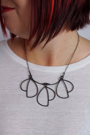 Trivolo Necklace in steel, silver, or bronze