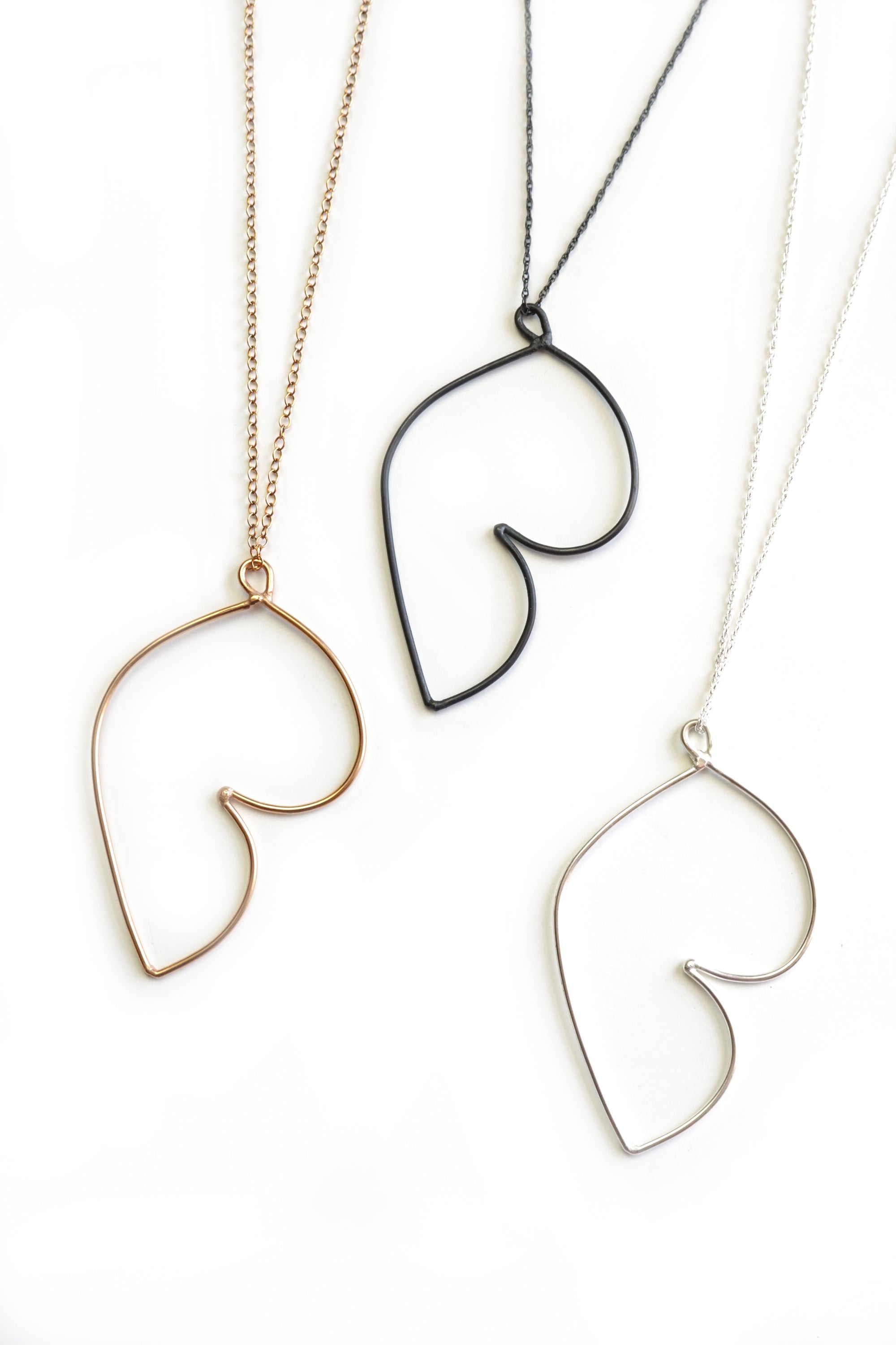 long handmade silver pendant inspired by Matisse